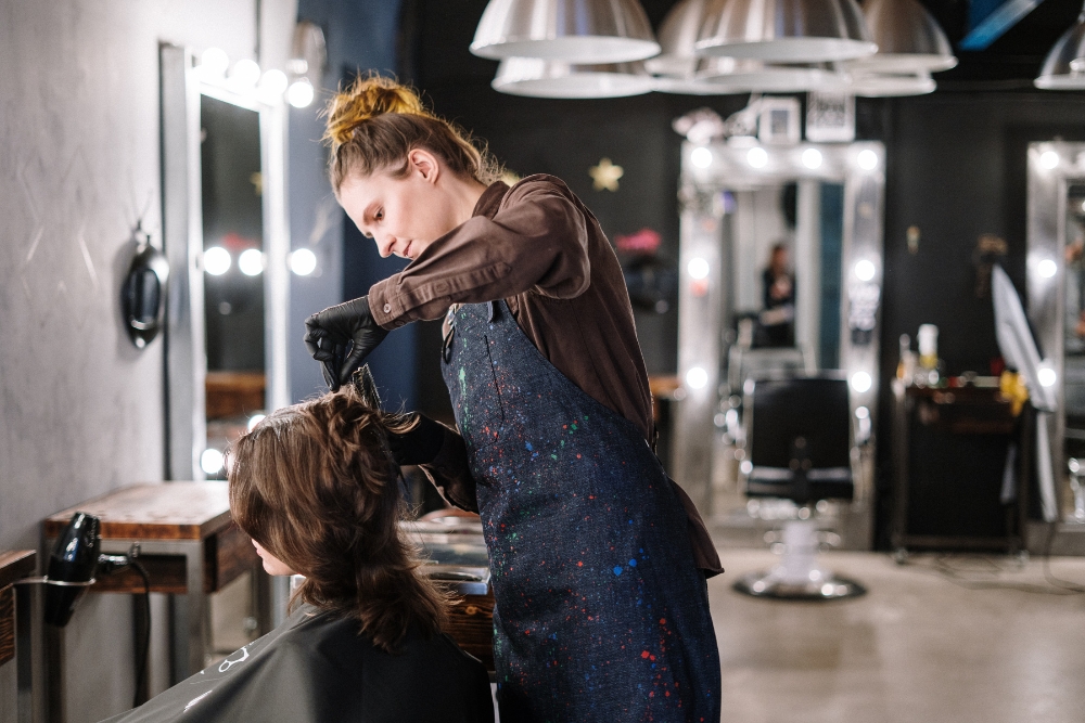 Women getting a haircut at Beauty Salon